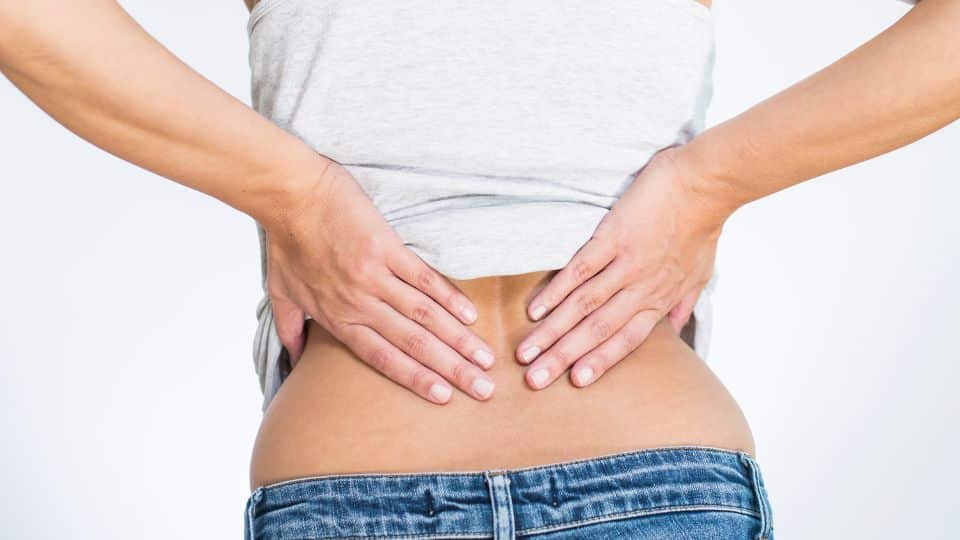 A Women Suffering From Back Pain