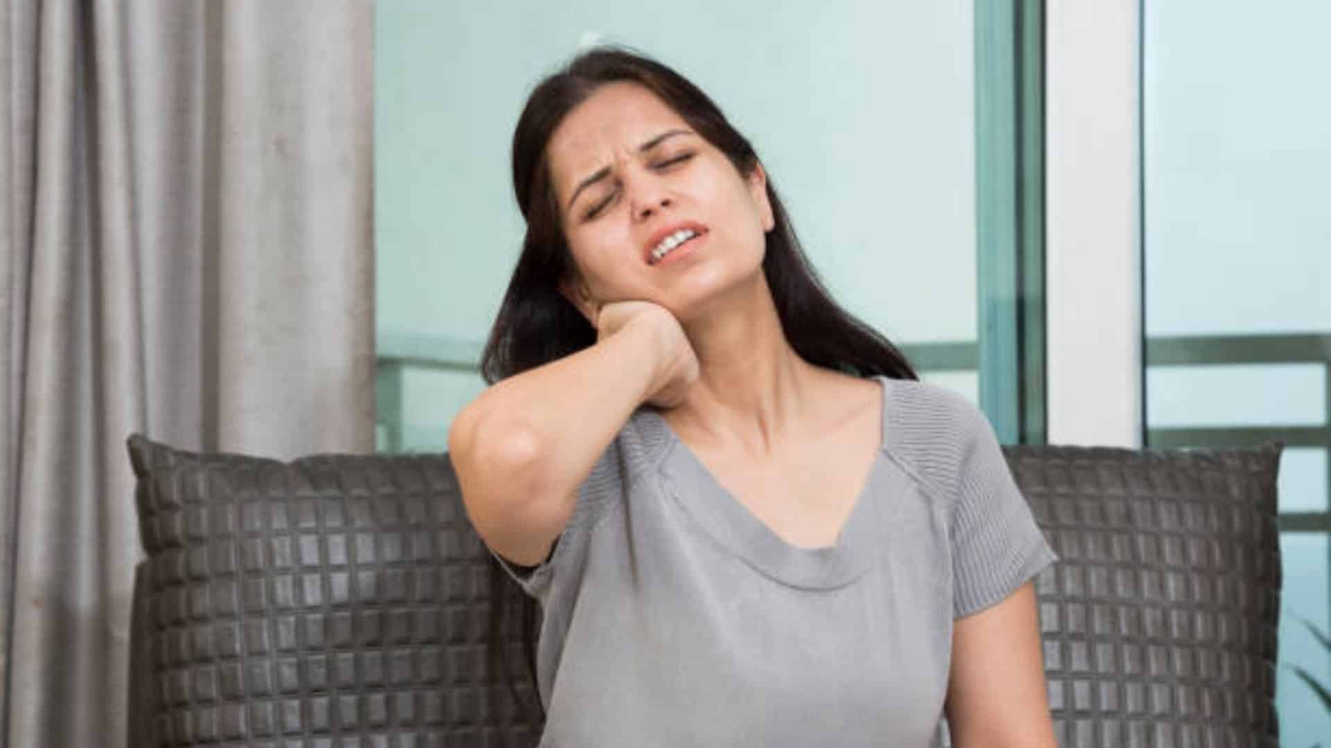 Women Suffering in Pain Due To Tight Neck Muscles