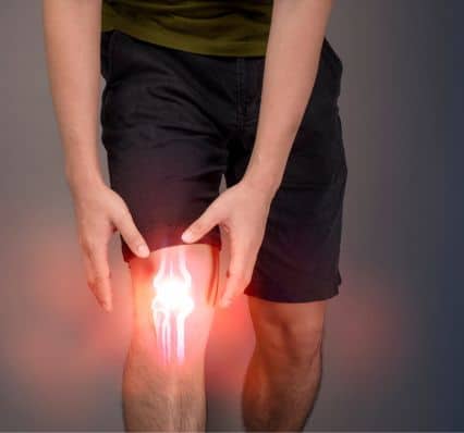 Person Suffering From Knee Pain